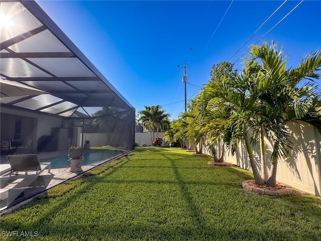 view of yard featuring a lanai