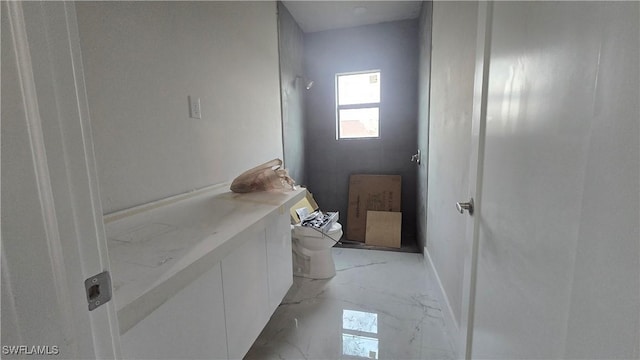 bathroom featuring toilet