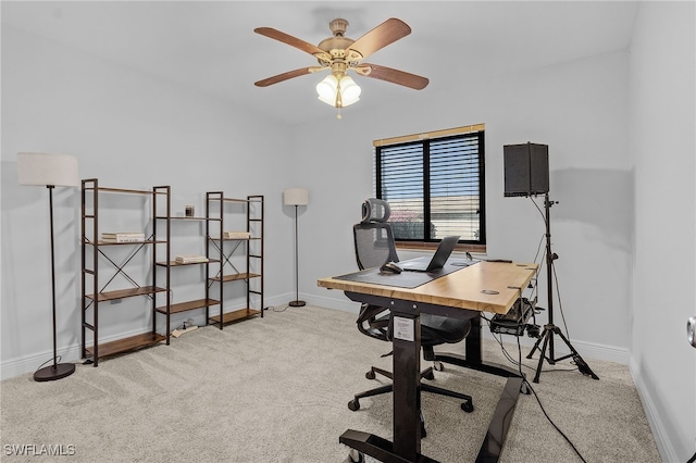 home office featuring ceiling fan and light colored carpet