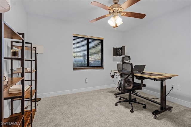 home office with carpet flooring and ceiling fan