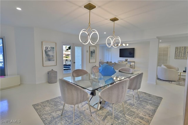 dining area with a chandelier