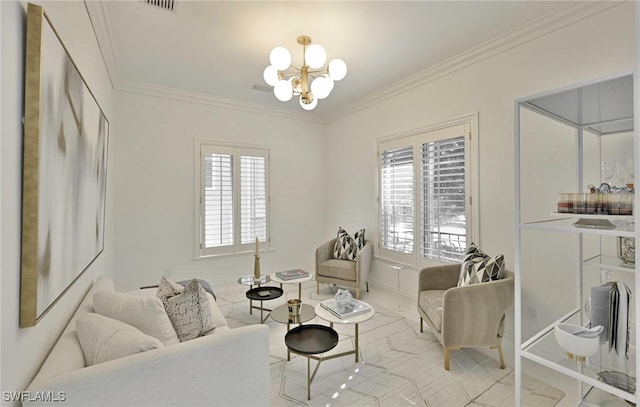 living room with a wealth of natural light, ornamental molding, and an inviting chandelier