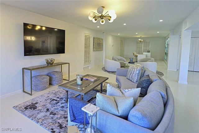 living room featuring an inviting chandelier