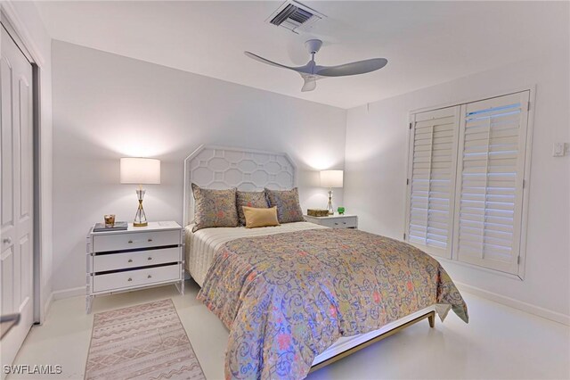 bedroom featuring ceiling fan and a closet