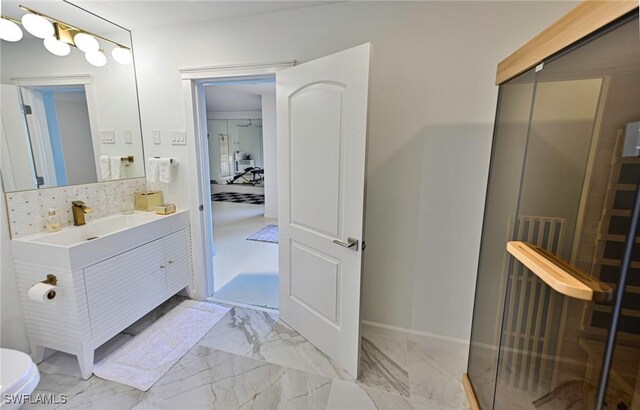 bathroom with toilet and vanity