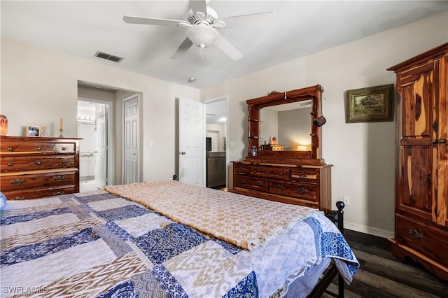 bedroom featuring ensuite bath, ceiling fan, and dark hardwood / wood-style floors