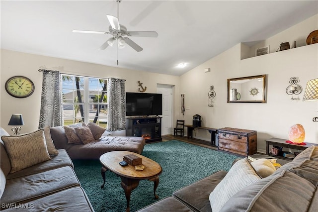 living room with ceiling fan and vaulted ceiling