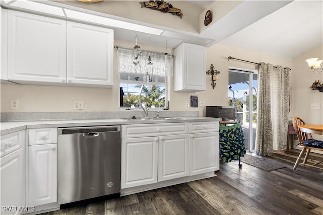 kitchen featuring dishwasher, white cabinets, plenty of natural light, and sink