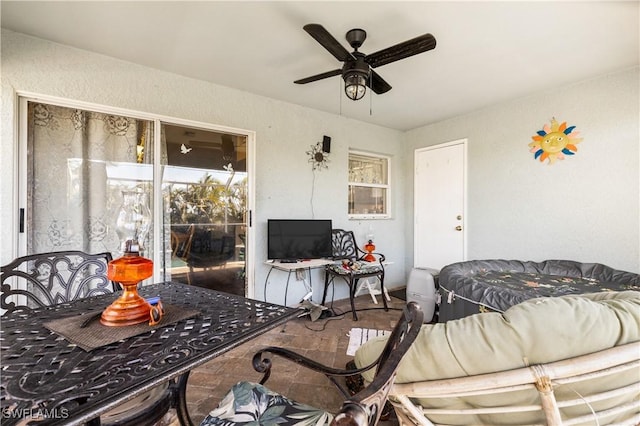 living room with ceiling fan