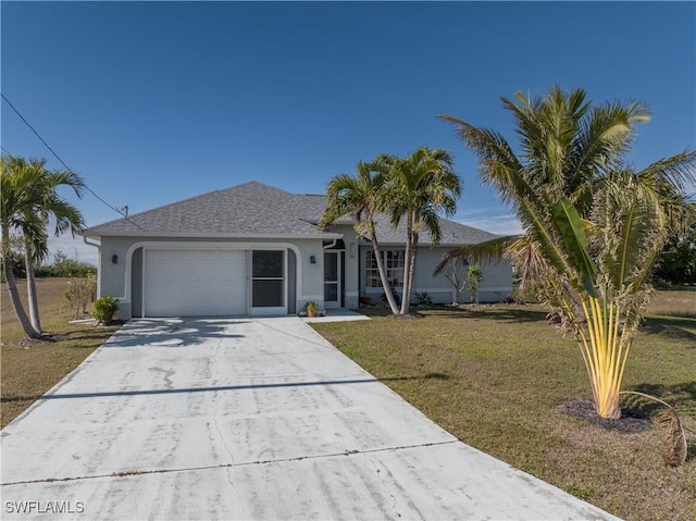 single story home with a front lawn and a garage