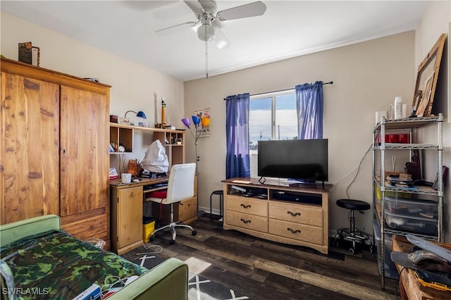 home office featuring ceiling fan and dark wood-type flooring