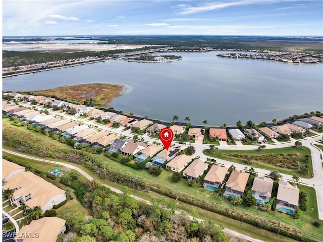 drone / aerial view featuring a water view