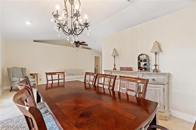 dining space with light tile patterned floors, ceiling fan with notable chandelier, and vaulted ceiling