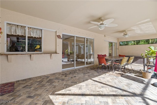 view of patio / terrace with ceiling fan