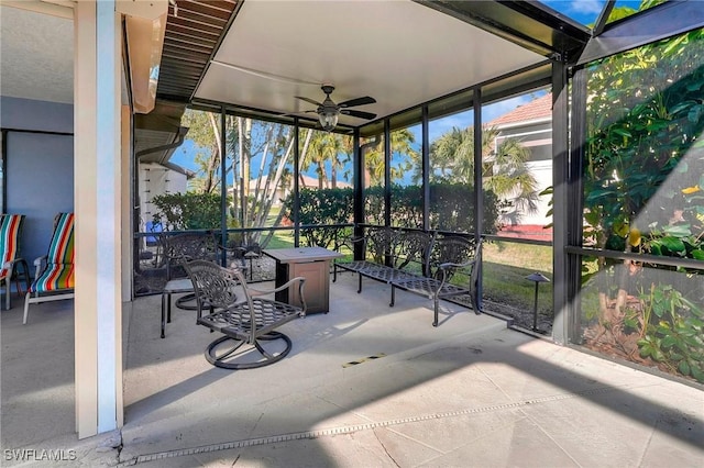 sunroom / solarium with ceiling fan