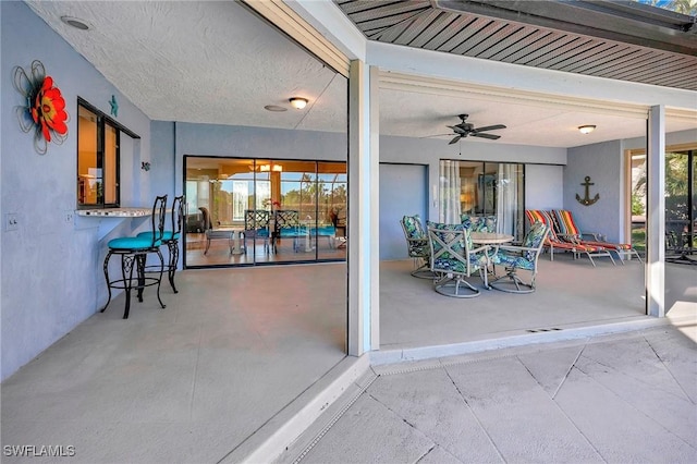 view of patio / terrace with ceiling fan