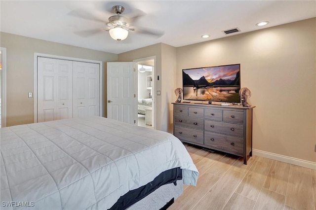 bedroom featuring ceiling fan and a closet