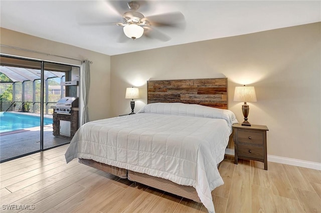 bedroom featuring access to outside, ceiling fan, and light wood-type flooring