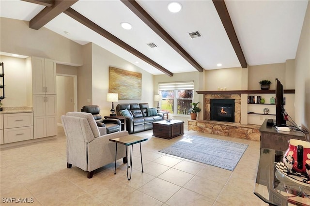 tiled living room with a fireplace and lofted ceiling with beams