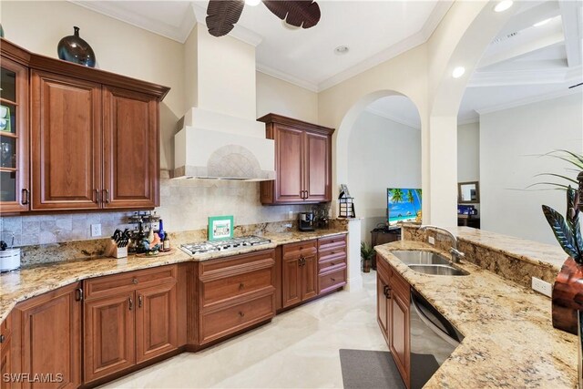 kitchen featuring sink, ceiling fan, tasteful backsplash, and appliances with stainless steel finishes