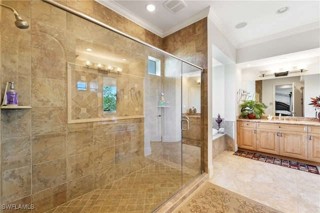 bathroom with ornamental molding, separate shower and tub, and vanity