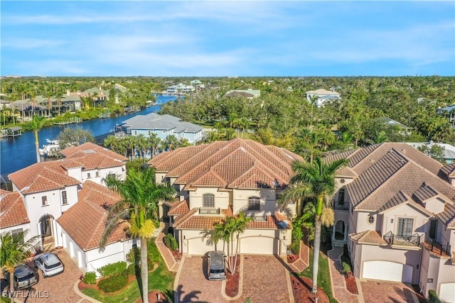 drone / aerial view with a water view