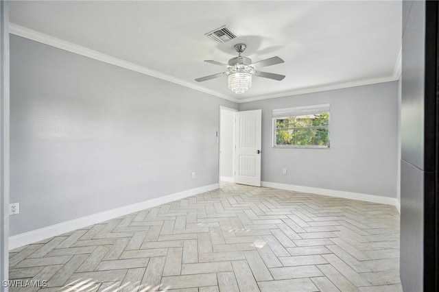 unfurnished room with light parquet floors, ceiling fan, and crown molding