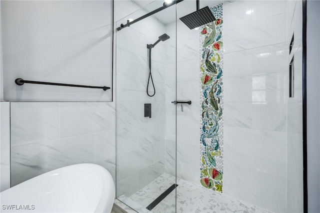 bathroom with shower with separate bathtub