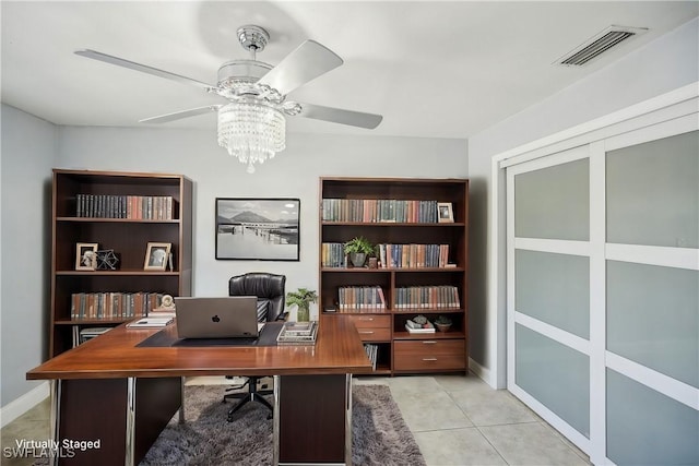 tiled home office with ceiling fan