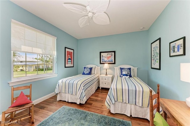 bedroom featuring ceiling fan and hardwood / wood-style floors