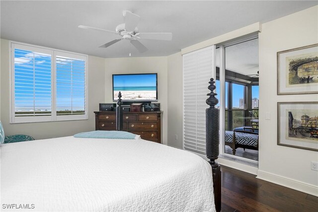 bedroom with ceiling fan and dark hardwood / wood-style flooring