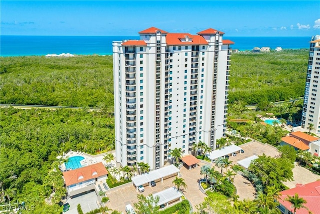 birds eye view of property featuring a water view