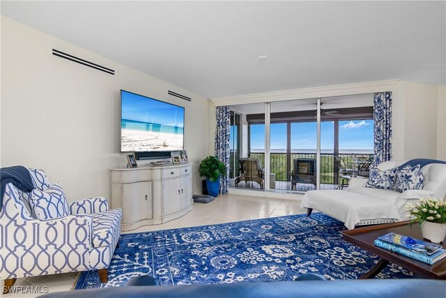 living room with floor to ceiling windows