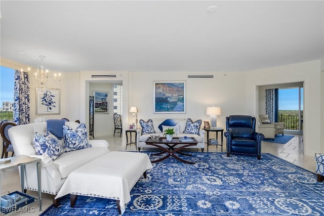 living room with an inviting chandelier