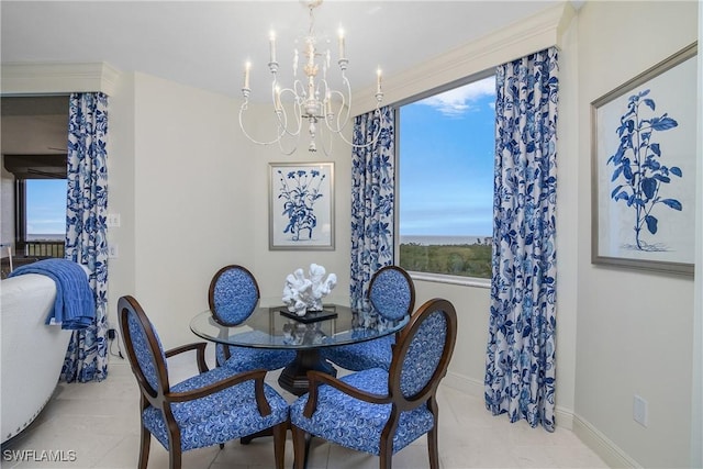 tiled dining space with a notable chandelier