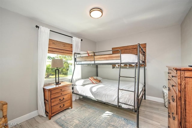 bedroom with light hardwood / wood-style floors