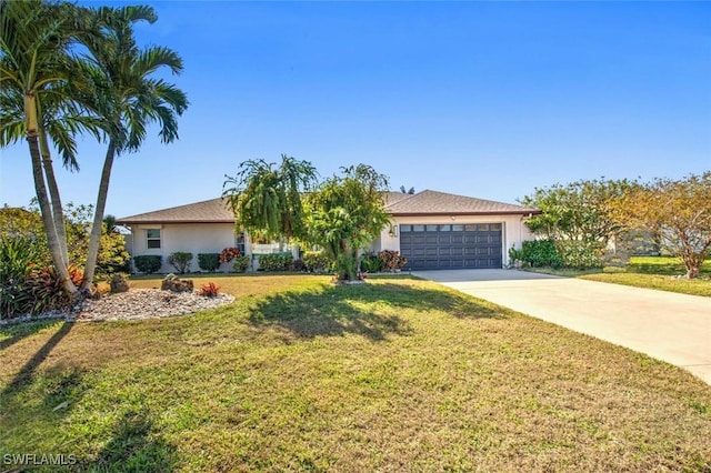 ranch-style home featuring a front yard and a garage