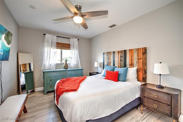 bedroom featuring ceiling fan and light wood-type flooring