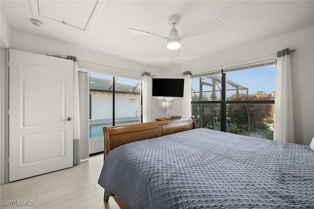 bedroom featuring ceiling fan and light hardwood / wood-style flooring