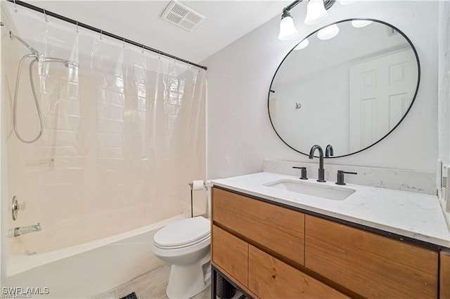 full bathroom featuring vanity, toilet, and shower / bathtub combination with curtain