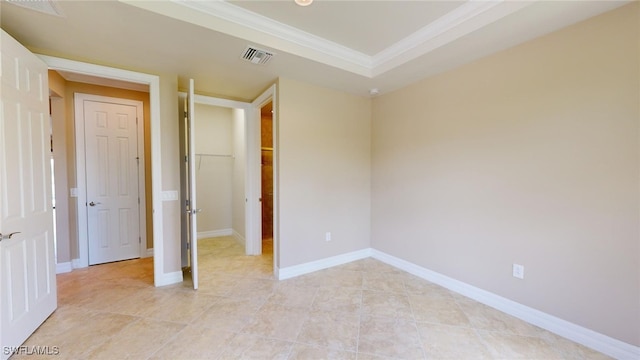 unfurnished bedroom featuring crown molding