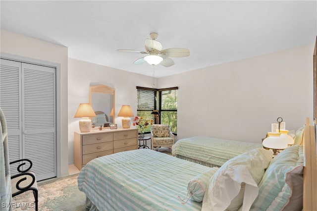 bedroom featuring a closet and ceiling fan