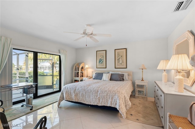 tiled bedroom featuring access to outside and ceiling fan