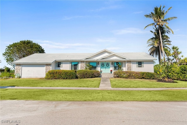 single story home with a front yard