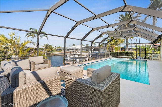 view of swimming pool featuring glass enclosure, a patio area, and a water view