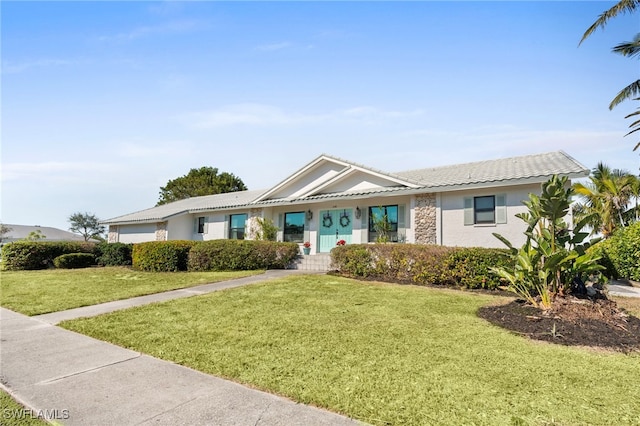 single story home featuring a front yard