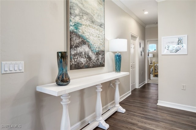 hall with crown molding and dark wood-type flooring