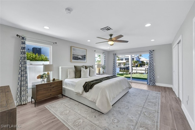 bedroom with access to exterior and ceiling fan