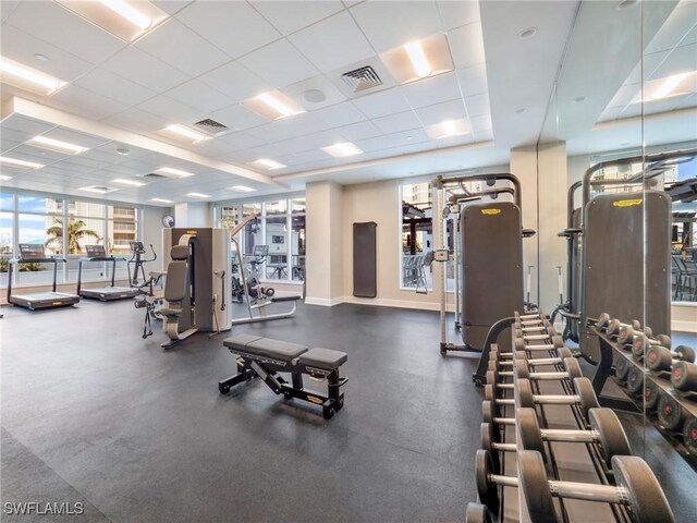 workout area with a drop ceiling