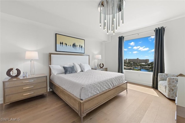 bedroom featuring light hardwood / wood-style floors